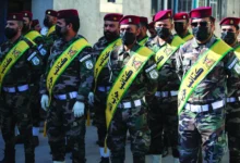 عناصر من كتائب حزب الله العراقية خلال تجمع